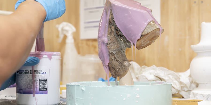 An object covered in lilac liquid 