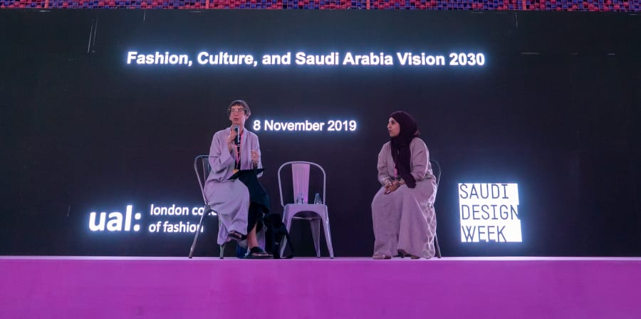 Photograph of 2 women on stage