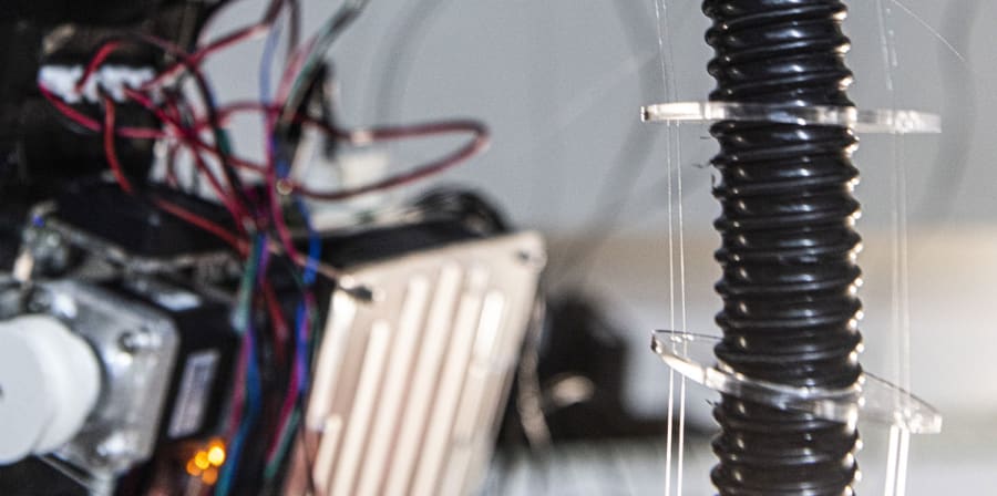 Student Mich Tsai's project, a curved spinal 'backpack' which can be worn to explore posture.
