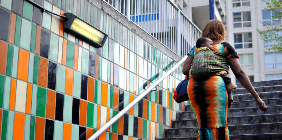 Woman walking up the stairs