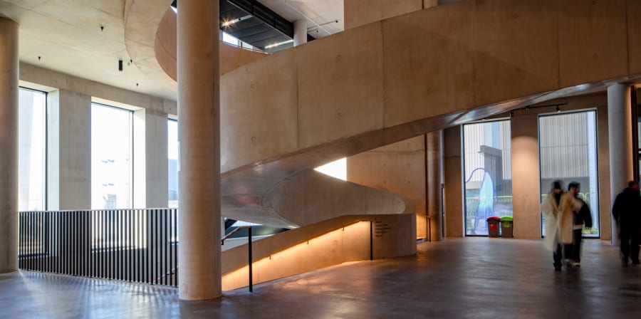 Photo of the winding stone staircase at London College of Fashion, East Bank.