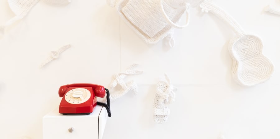 Knitted accessories and telephone installation by Xinyi Zhang, Summer Show. MA Designer Maker. Camberwell College of Arts, UAL.