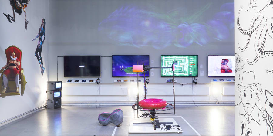 Exhibition view of multiple screen-based works by students.