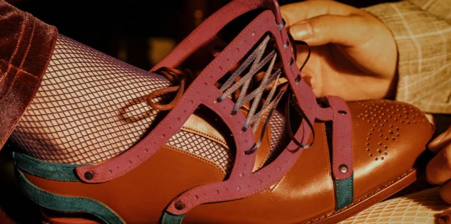 Close up of red leather shoe.