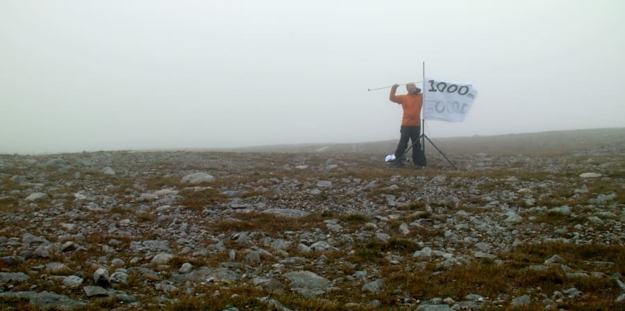 A person on top of a mountain