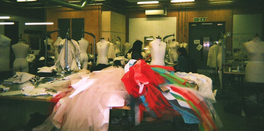Table with a big colorful garment 