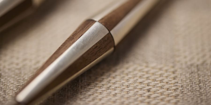 Close up shot of wooden and metal cutlery handles