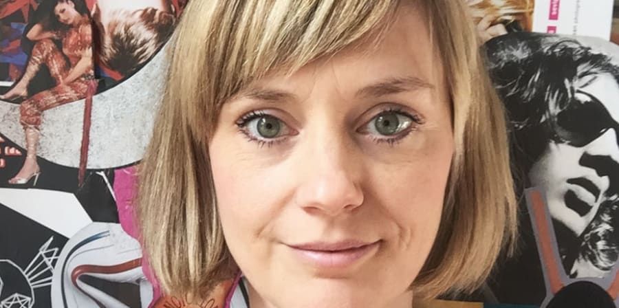 Selfie of Ildikó smiling into the camera infront of a collage