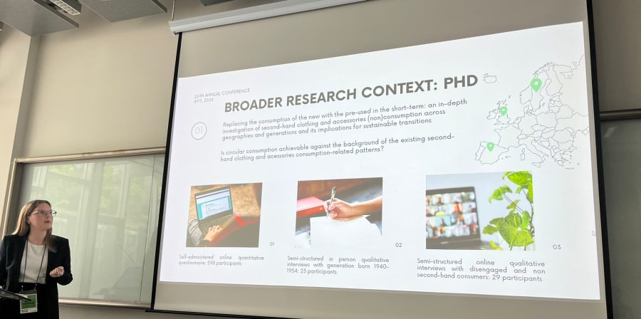 A person presenting something on a screen.