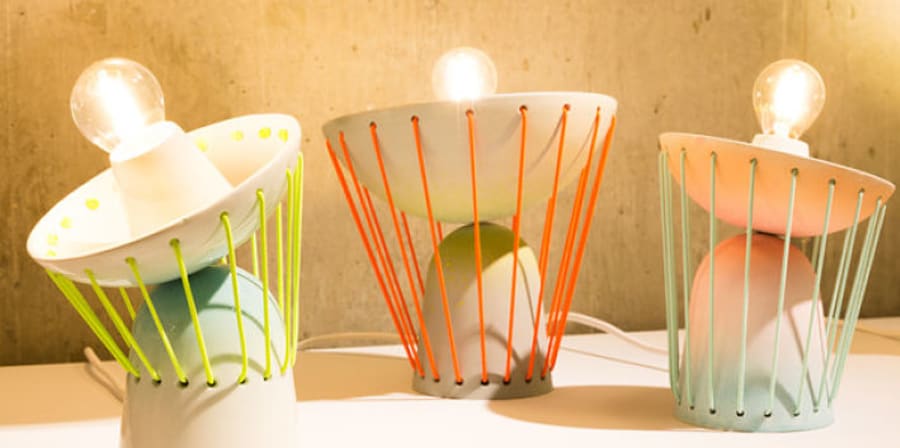A series of flexible desk lamps designed with brightly coloured elements