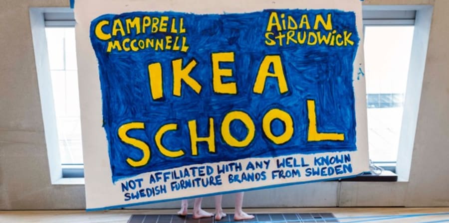 Handmade sign with 'Ikea school' written on it
