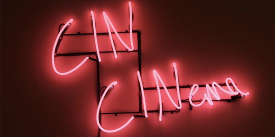 'Cin Cinema' written in pink neon