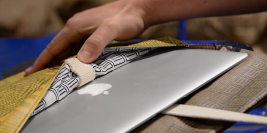 MAC laptop being put in a case