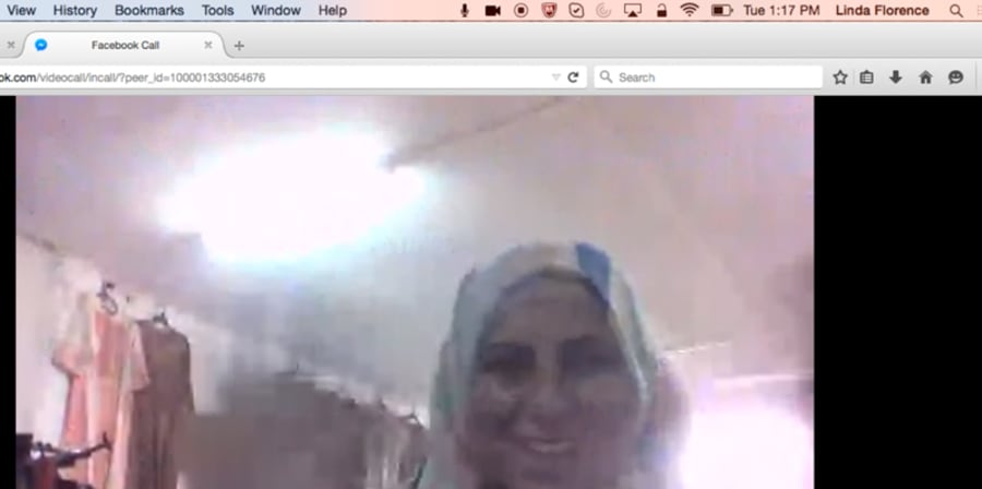 Screenshot of a woman on a Skype call