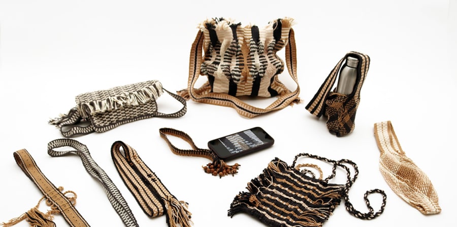 A collection of woven accessories against a white background