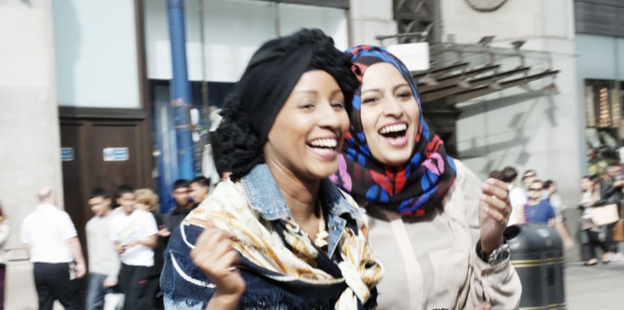 Cover image for Reina Lewis' book showing two Muslim women