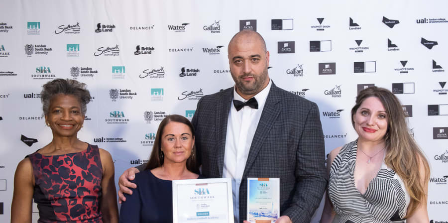 Ballers Academy manager Jamie accepting an award for Contribution to the Community at Southwark Business Excellence Awards 2019