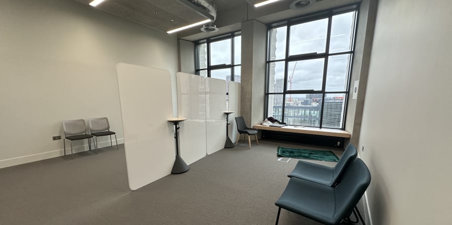 Room with chairs and long windows