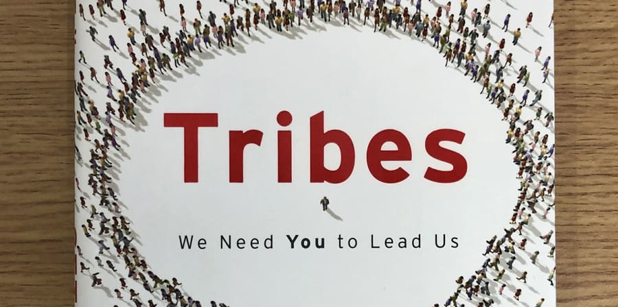 The book jacket of Tribes, which features a graphic of a crowd.