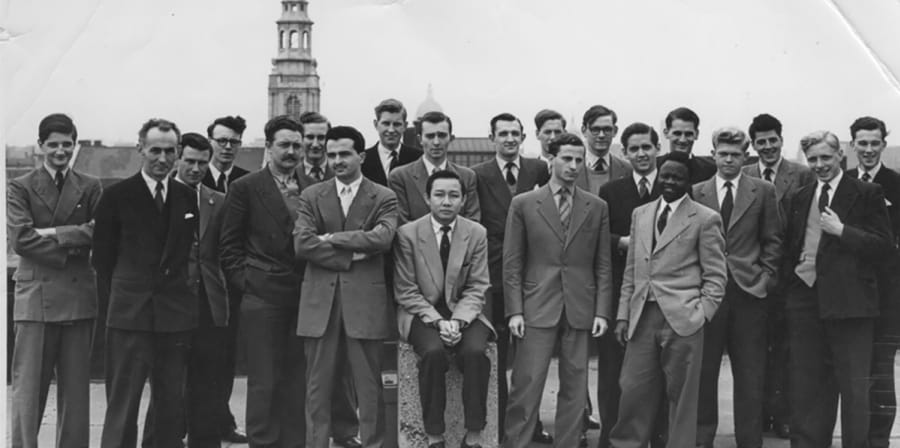 A black and white image of the group on a rooftop in 1956.