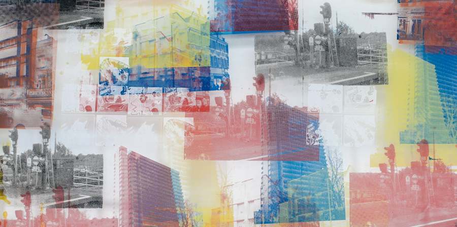 Screenprint of buildings in grey, red, yellow and blue