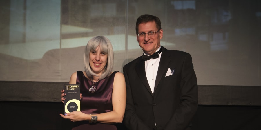 Rowan Williamson, Associate Director of Library Services (Services and Support) accepting the award. Credit: Times Higher Education