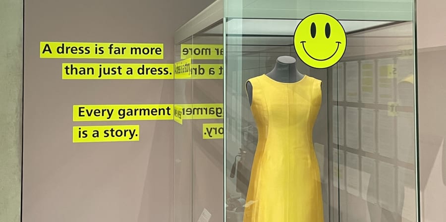 Dress by Balenciaga alongside text by performance artist Cheddar Gorgeous in a section of the exhibition examining fashion, dress and positive well-being.