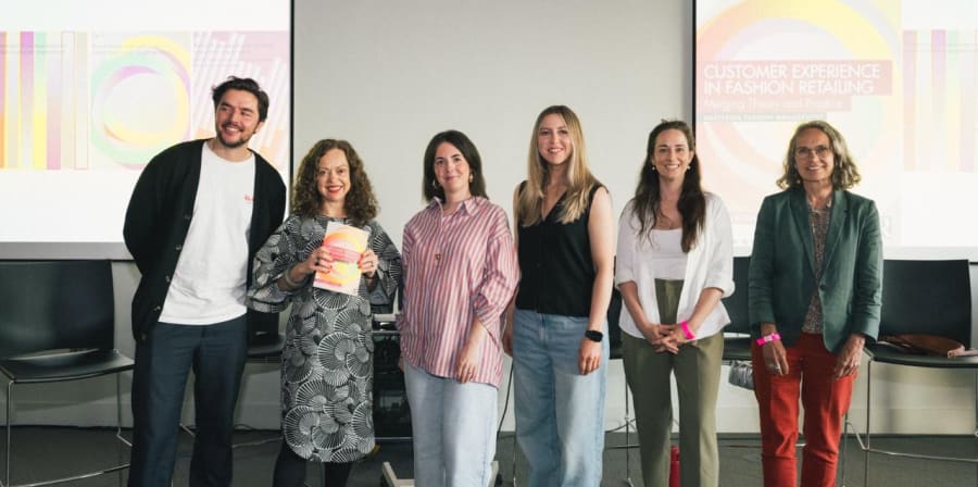 A group of people posing for the camera.
