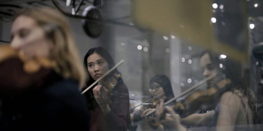 A photograph of an orchestral performance.