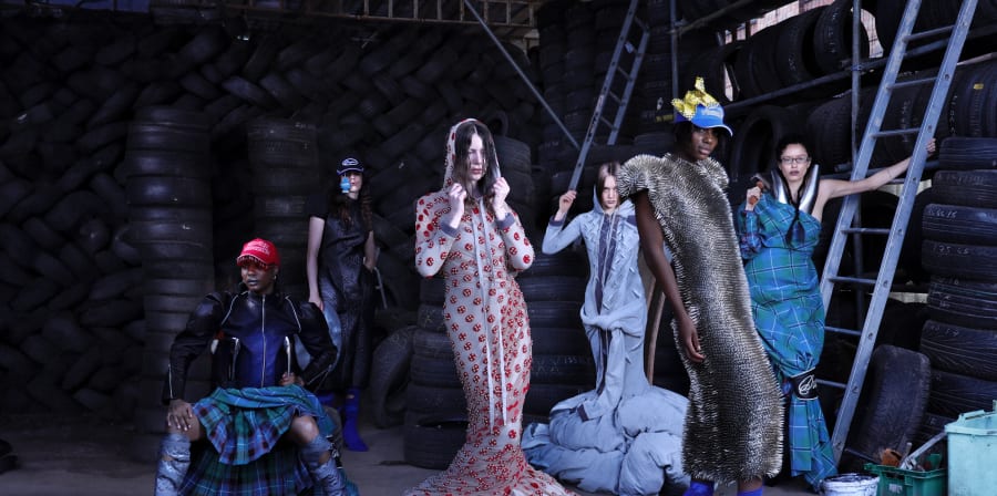 Models in avant garde garments shot in an industrial setting