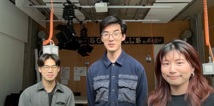 Image of 3 students (two men and one woman) on thumbnail of their youtube video