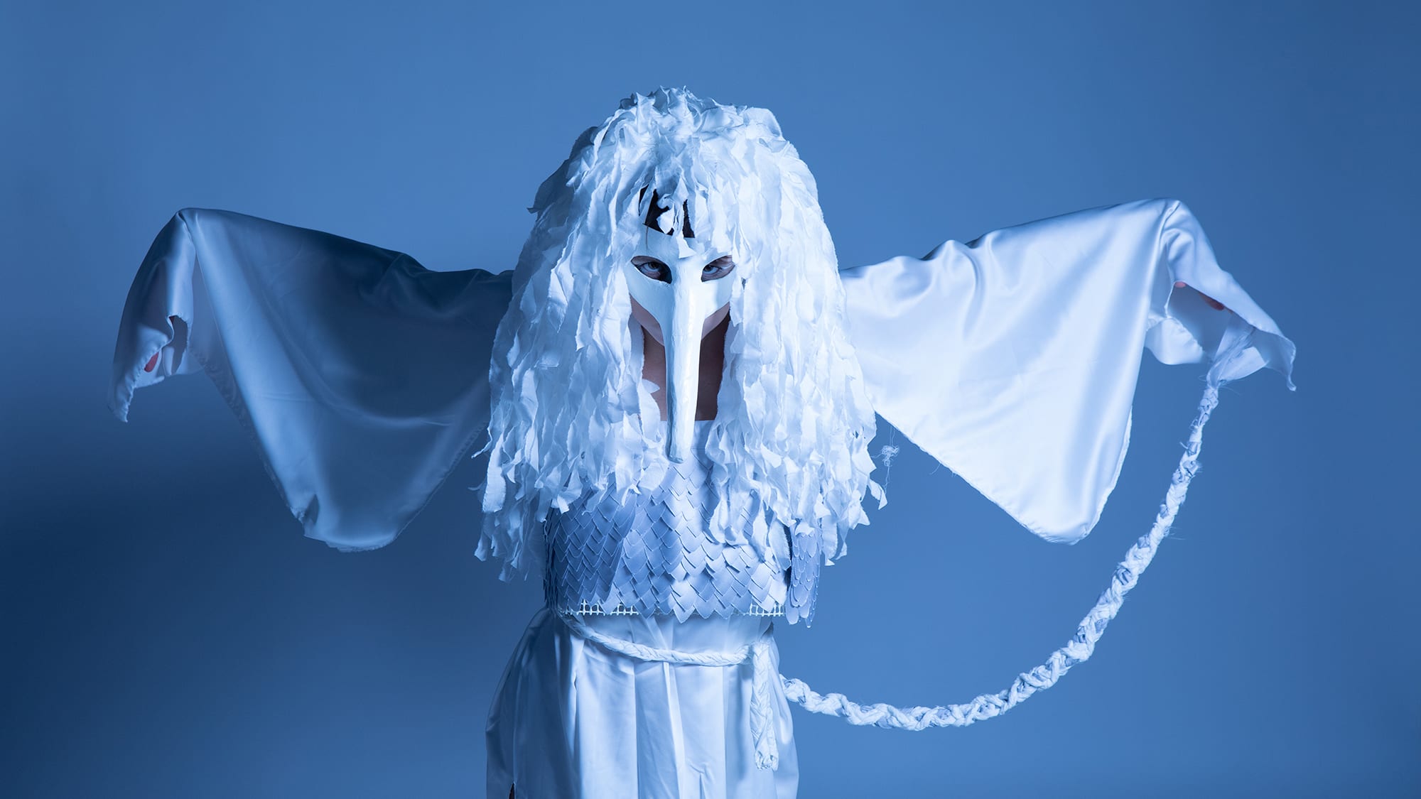 Actor wearing a white bird costume