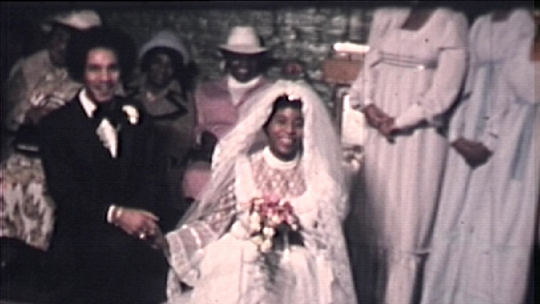 Still from a video recording of a wedding