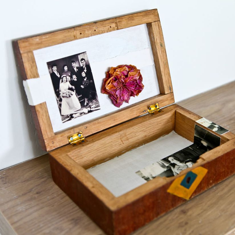 Wooden box with a photo inside sitting on a table