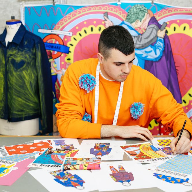 Tutor Dominic-Afsheen Akhavan-Moossavi working on his fashion illustrations.