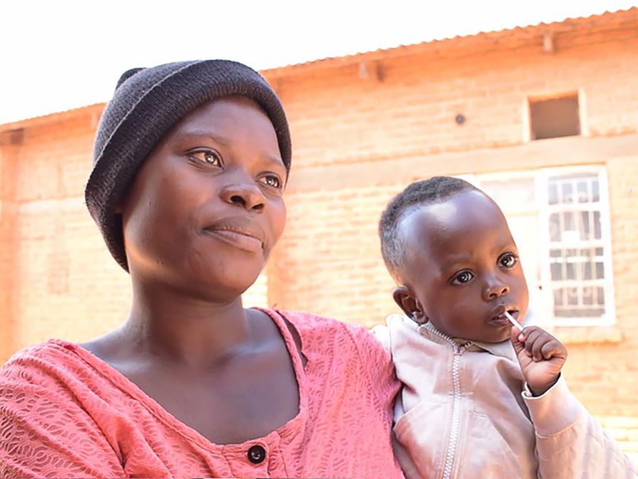 A photograph of a mother and her child.