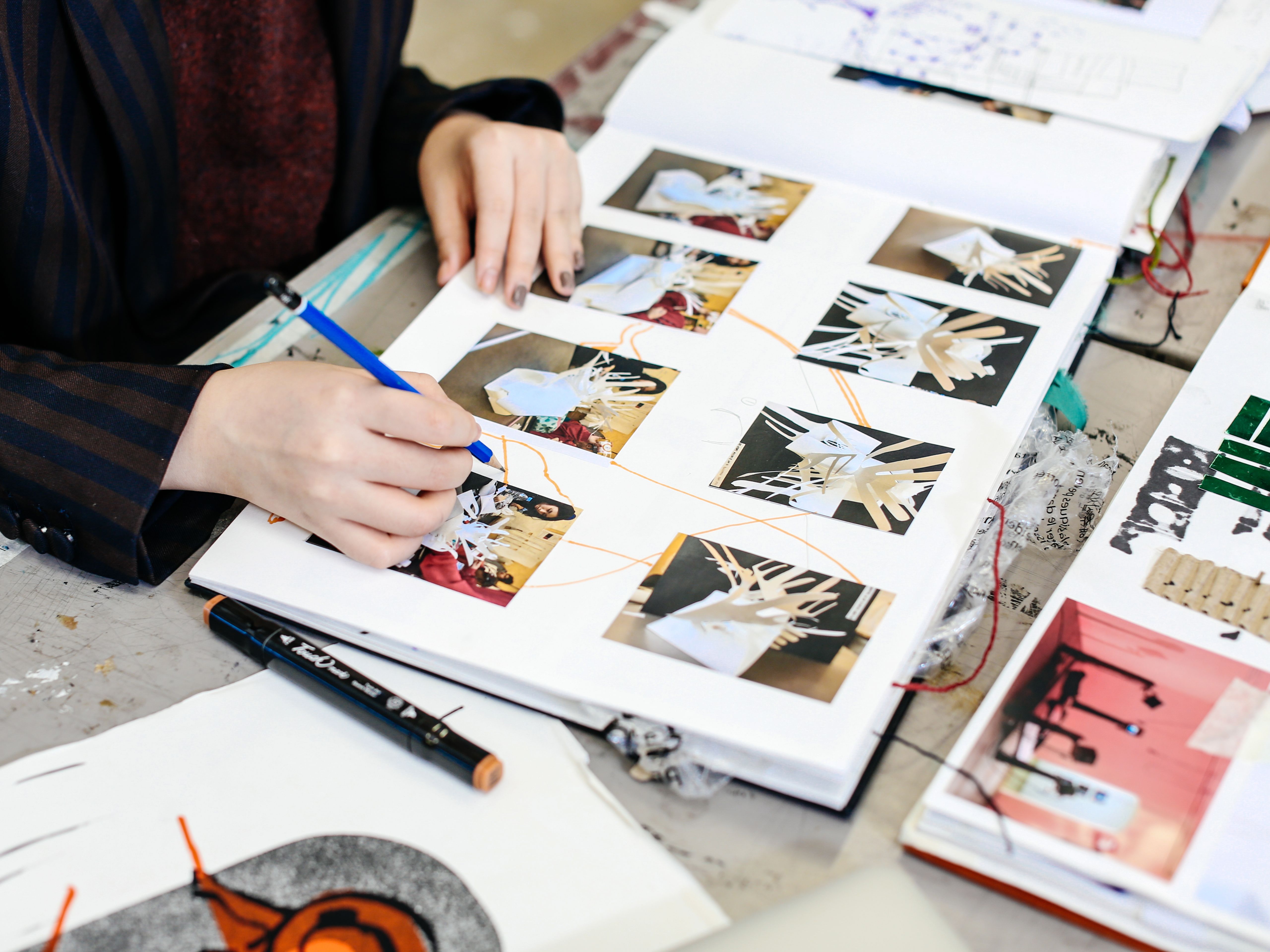 Student working in sketchbook