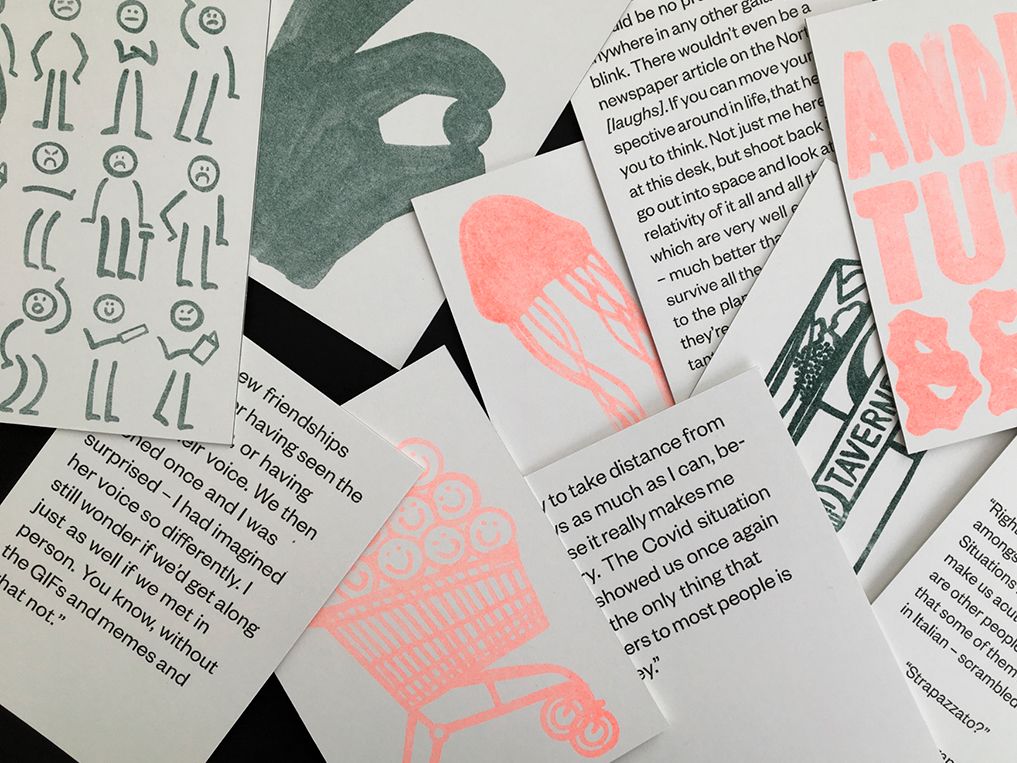 Photograph of several book pages printed with bright colours.