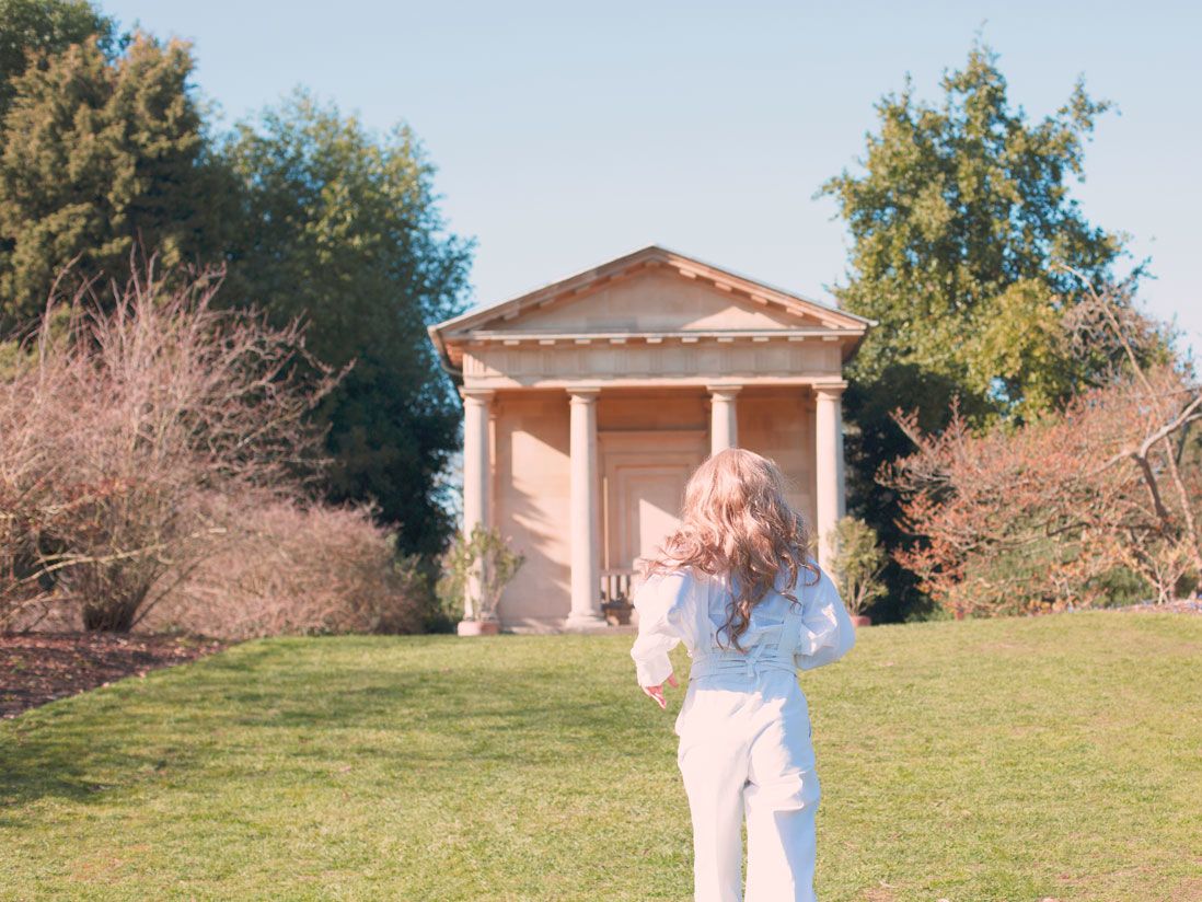 woman running in garden