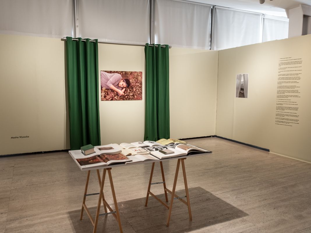 Photo of a table with artwork displayed