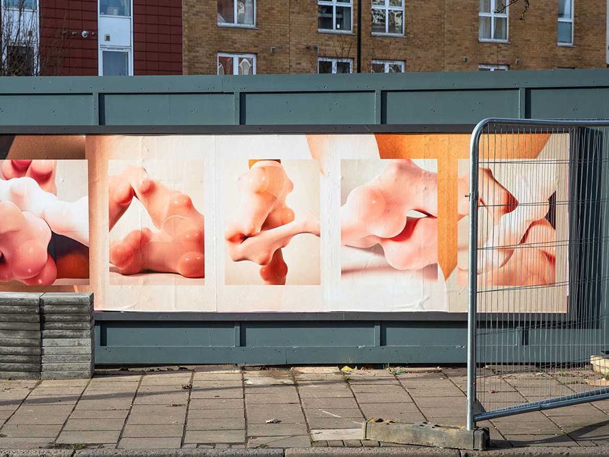 Photograph of a billboard featuring student work.