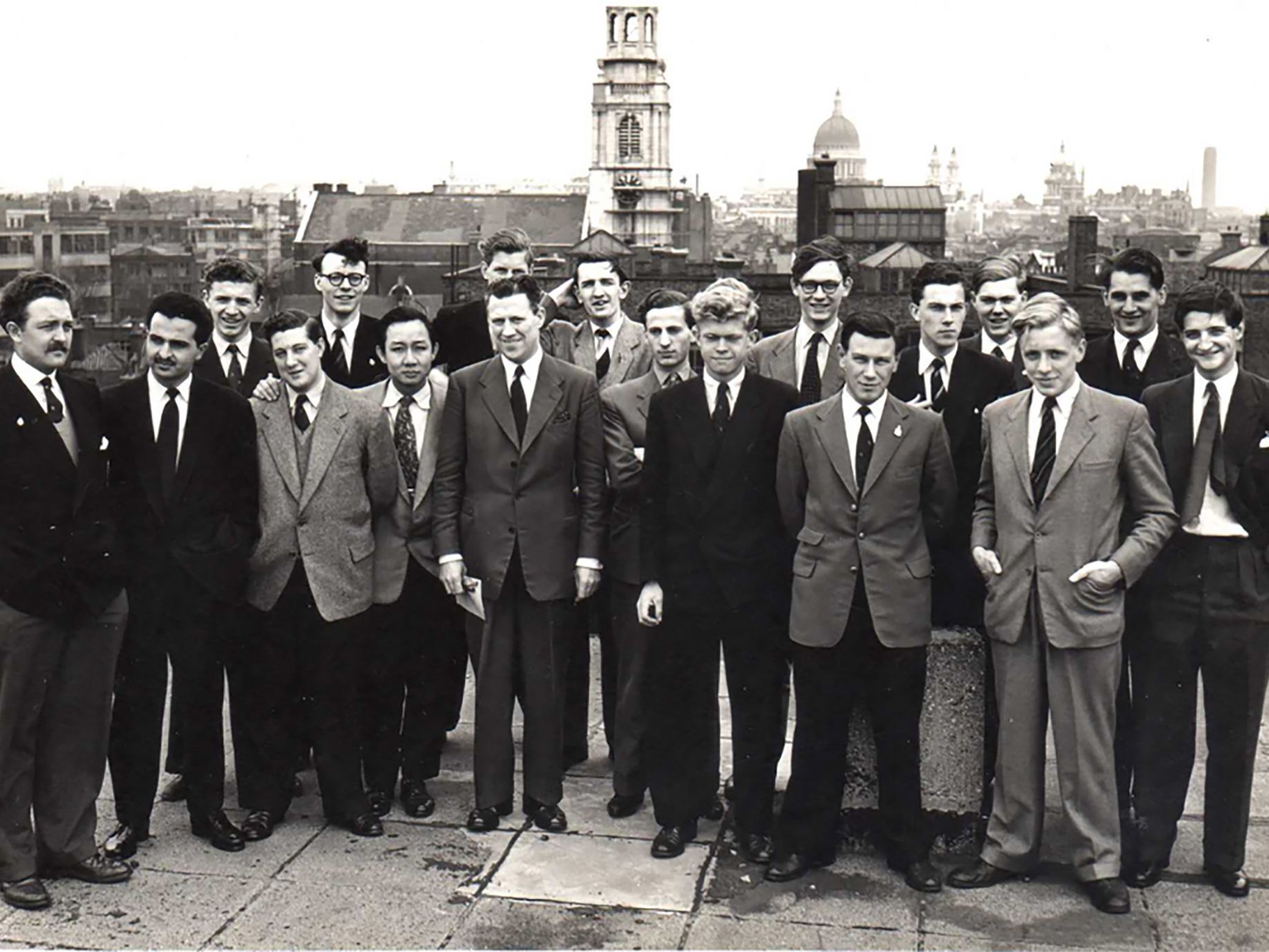 A photograph of the Class of 1956 on a rooftop.