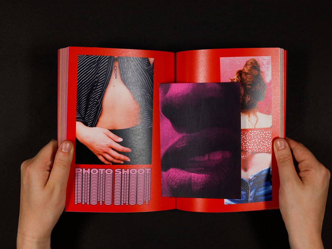 hands holding book open