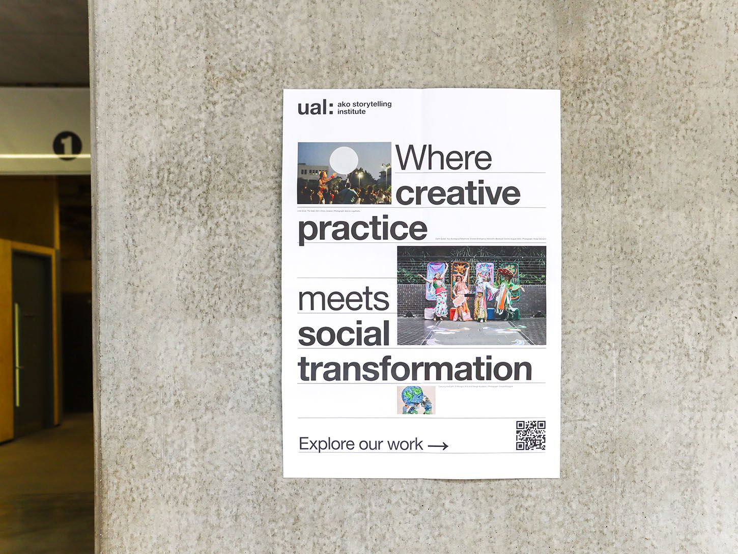 A poster stuck on a grey concrete wall which is in bright natural light. The poster reads 'UAL AKO Storytelling Institute, Where creative practice meets social transformation, explore our work'. The poster has 2 images and the text flows around the images to frame them.