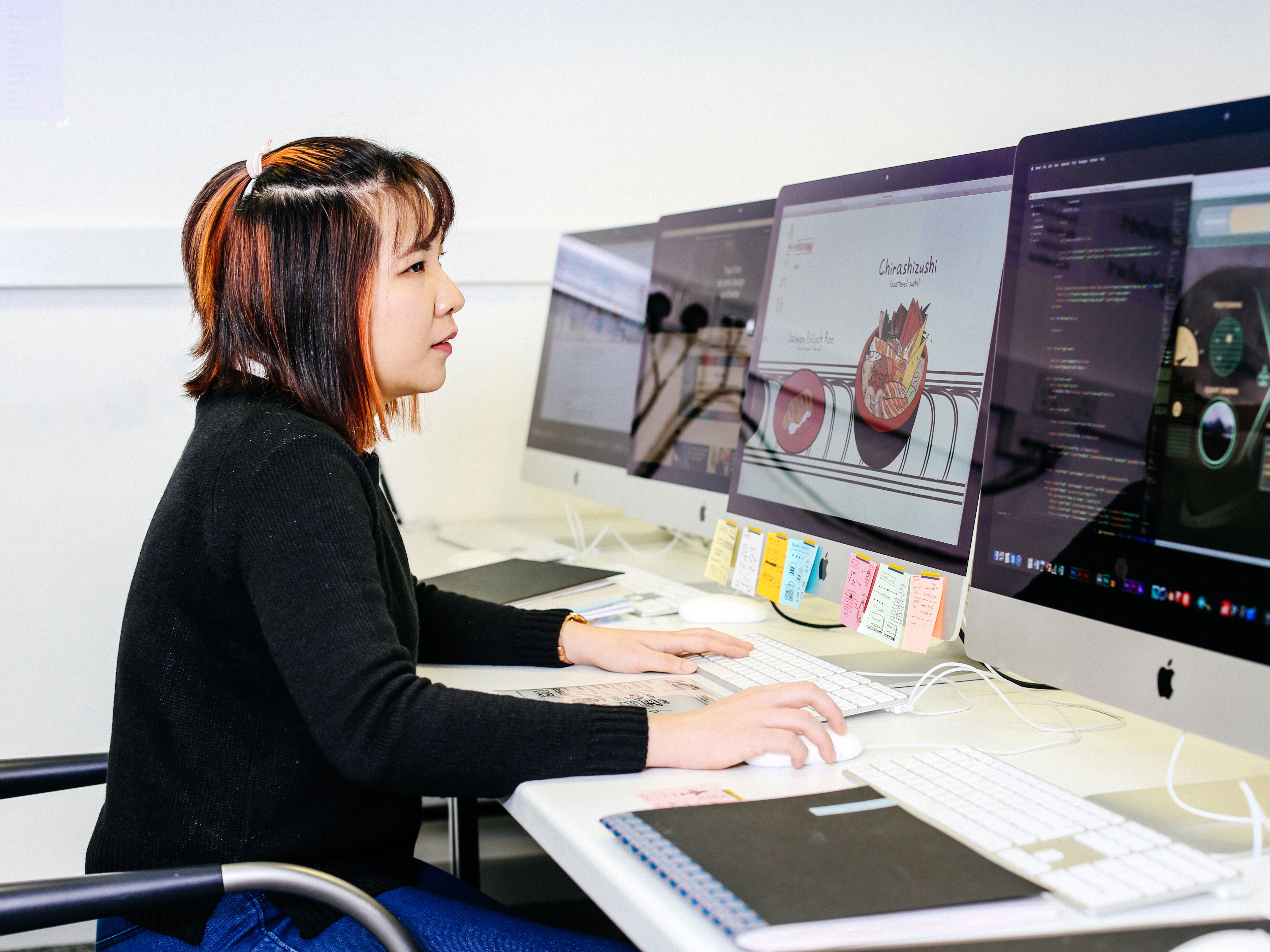 Person using multiple computers