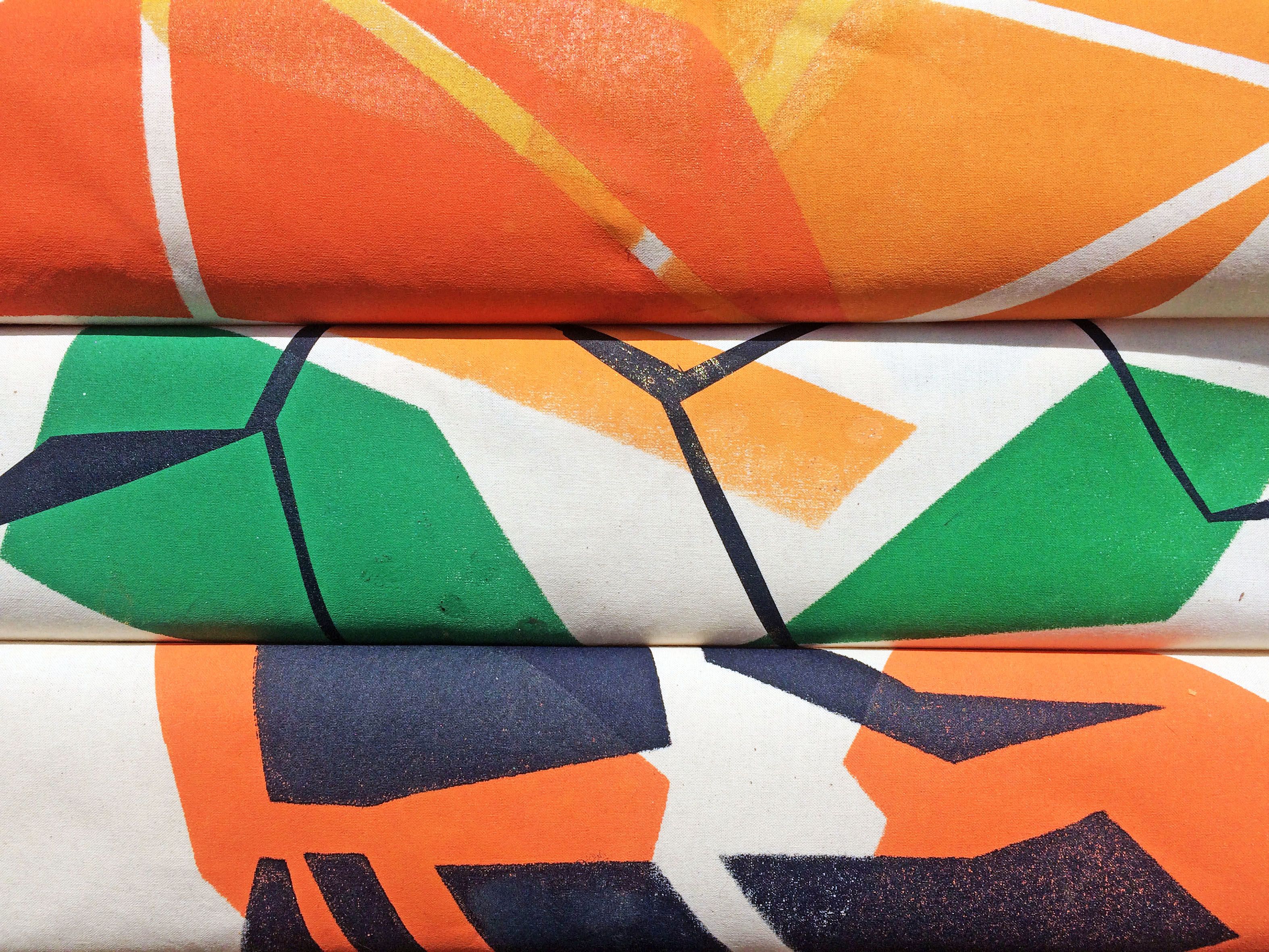 various colourful shapes, screen printed onto fabric