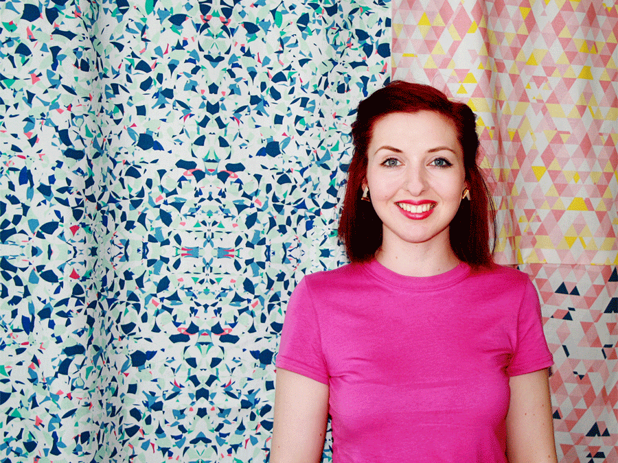 Portrait image of Beki Gowing against colourful fabric