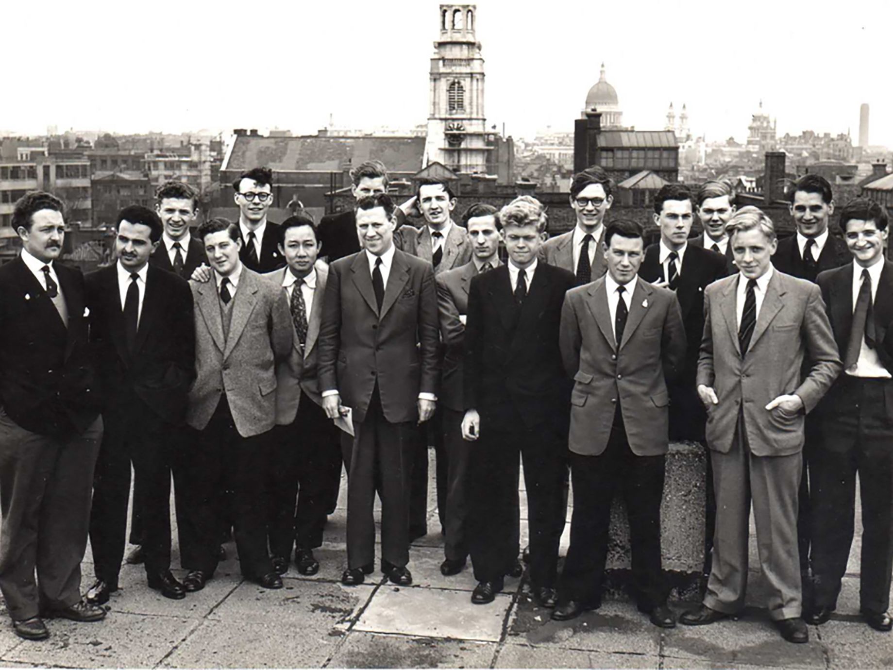 A photograph of the Class of 1956 on a rooftop.