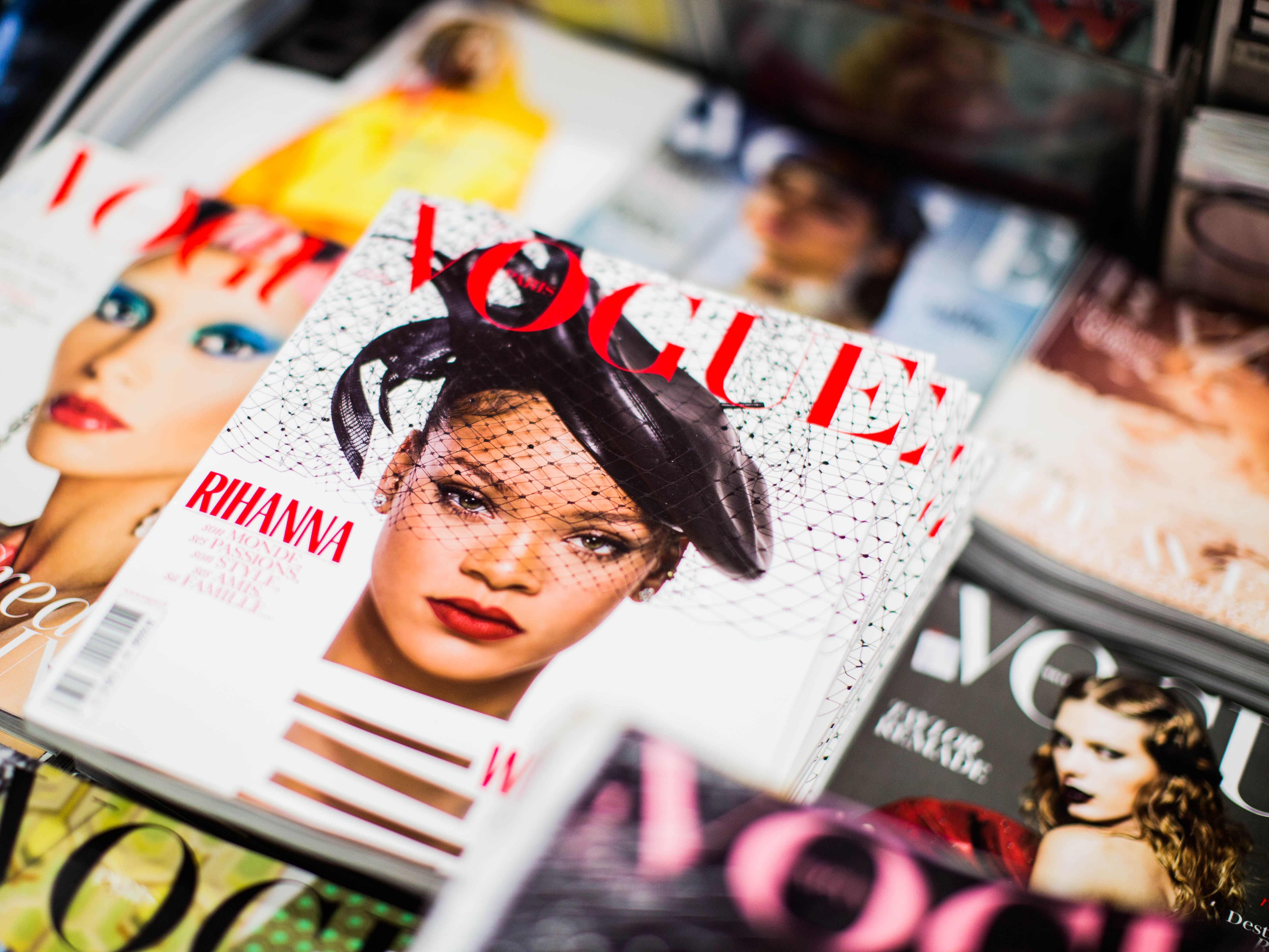 Close up of Vogue covers. The prominent cover features Rihanna. 