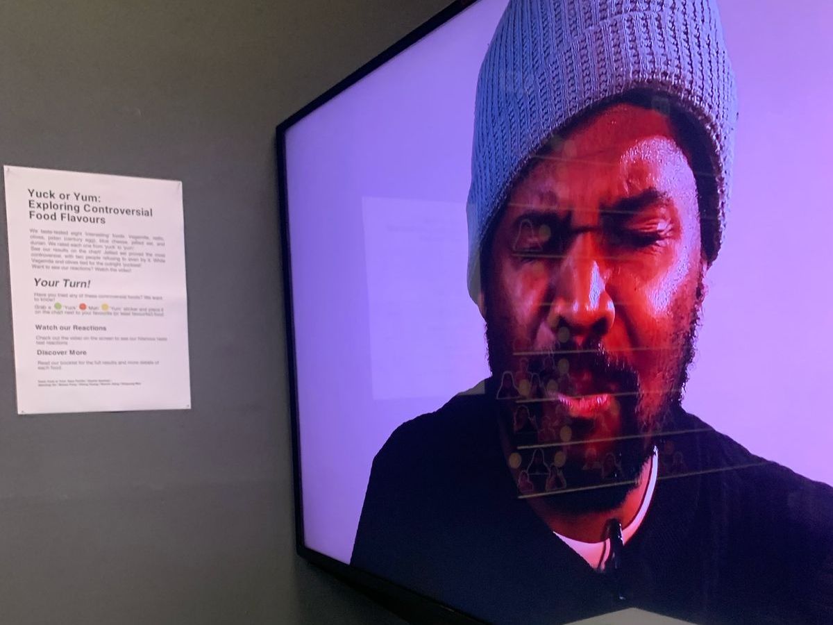 a person grimacing on a tv screen